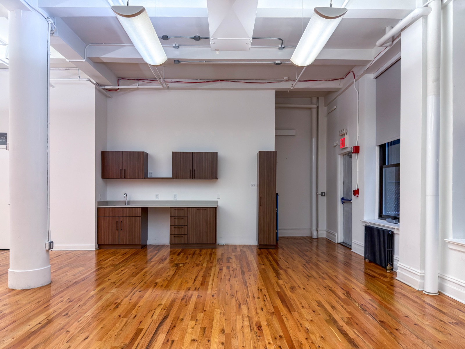 The Swider Studios kitchen with cabinets and counter